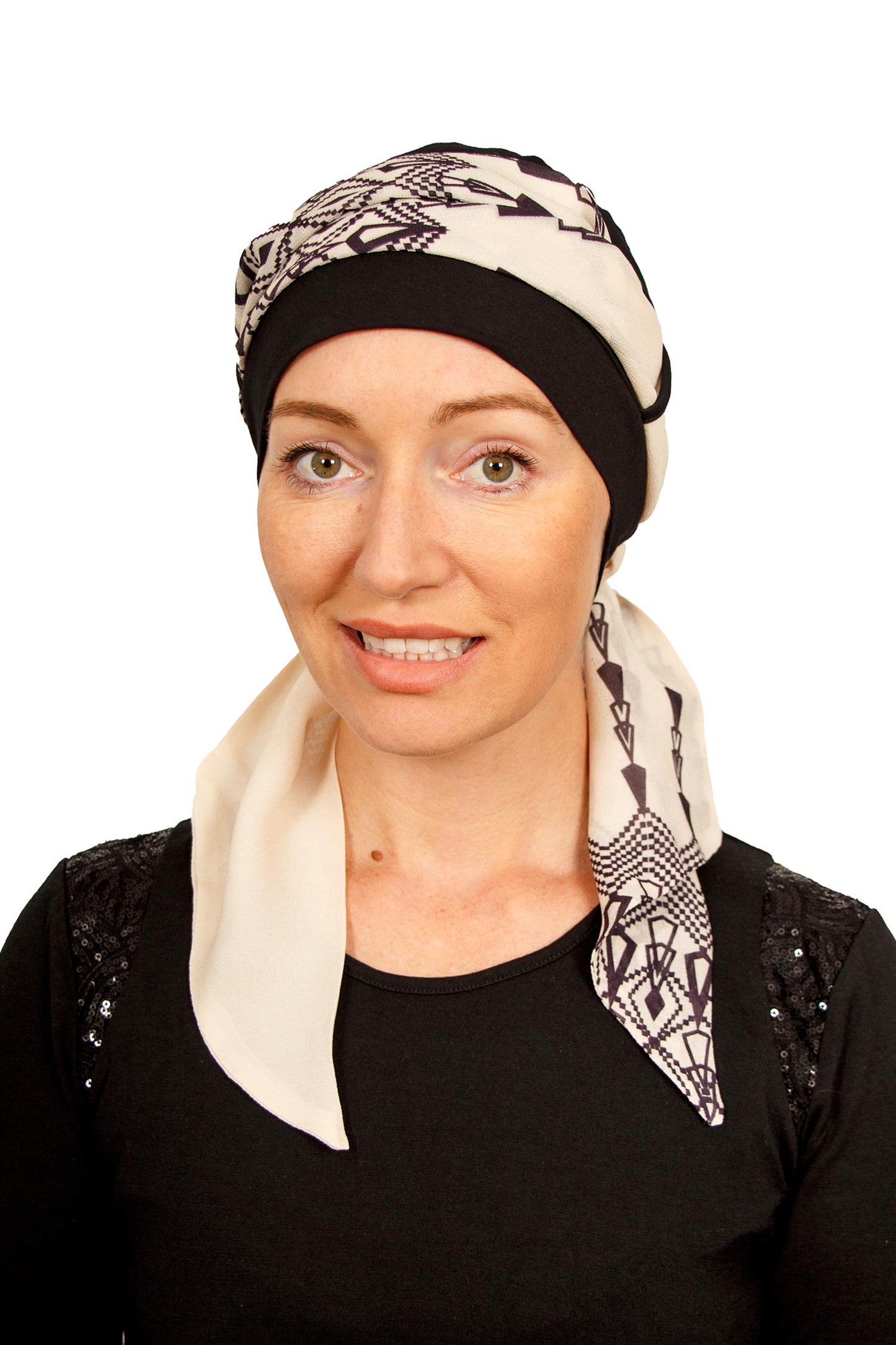Women Wearing a cancer cap with a scarf attached as a head covering in black in NZ