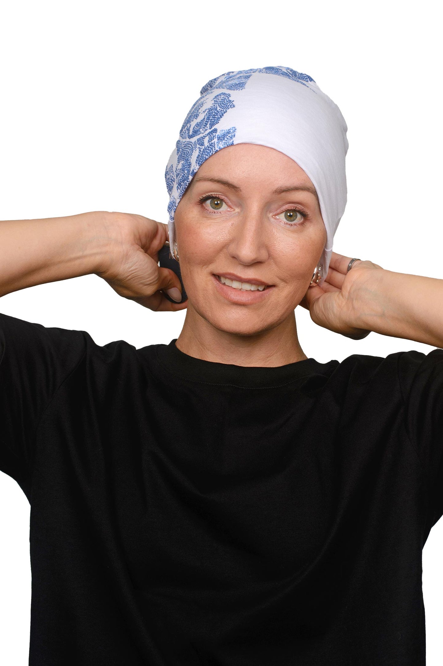 Women wearing a cancer nightcap in white and blue as a headcovering