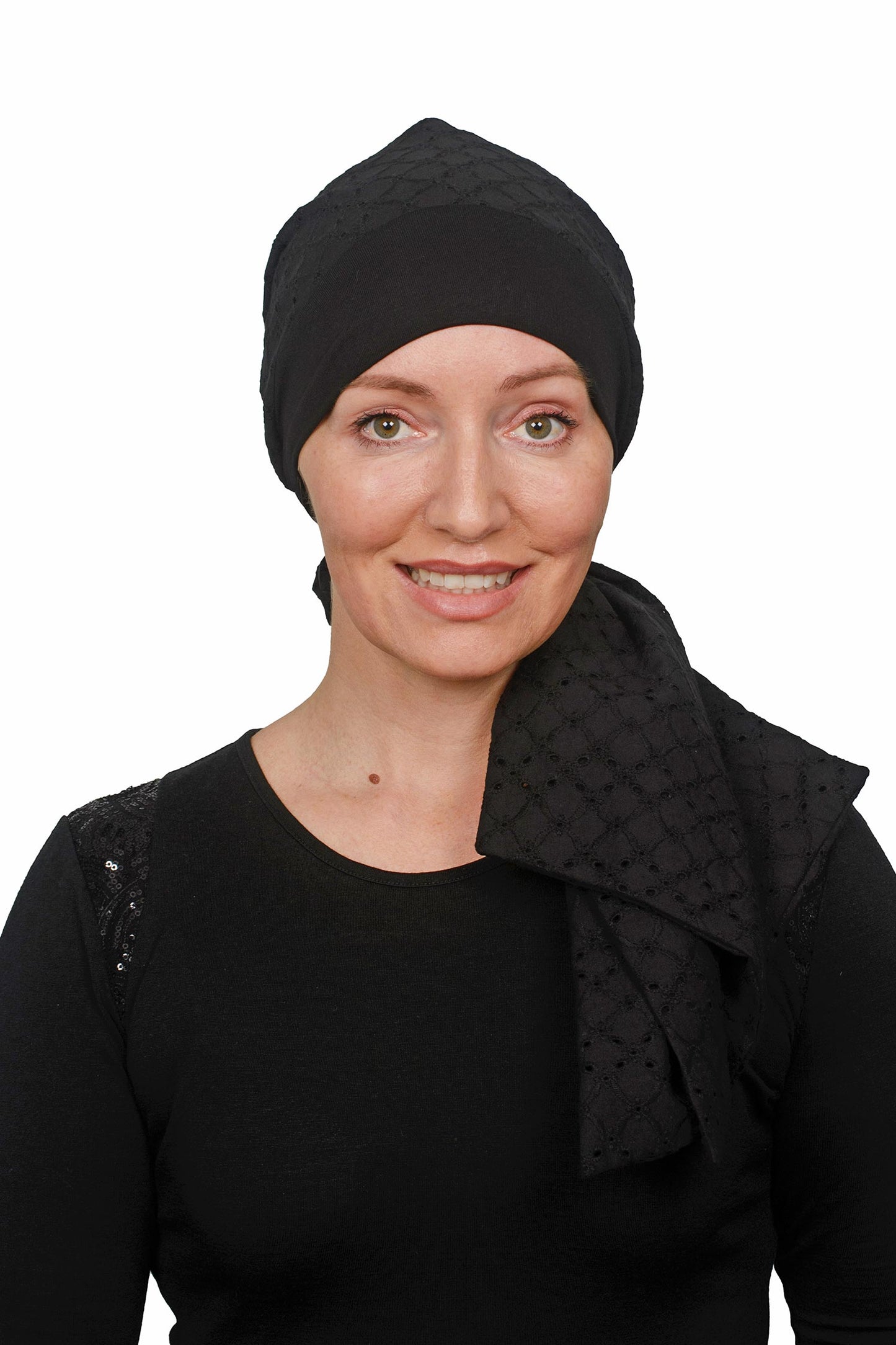 Women wearing a cancer scarf hat with a scrunchie and a band with embroidery cotton fabric as a wearable head scarf