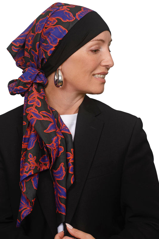 Women wearing a cancer headscarf in black and floral as a headcovering