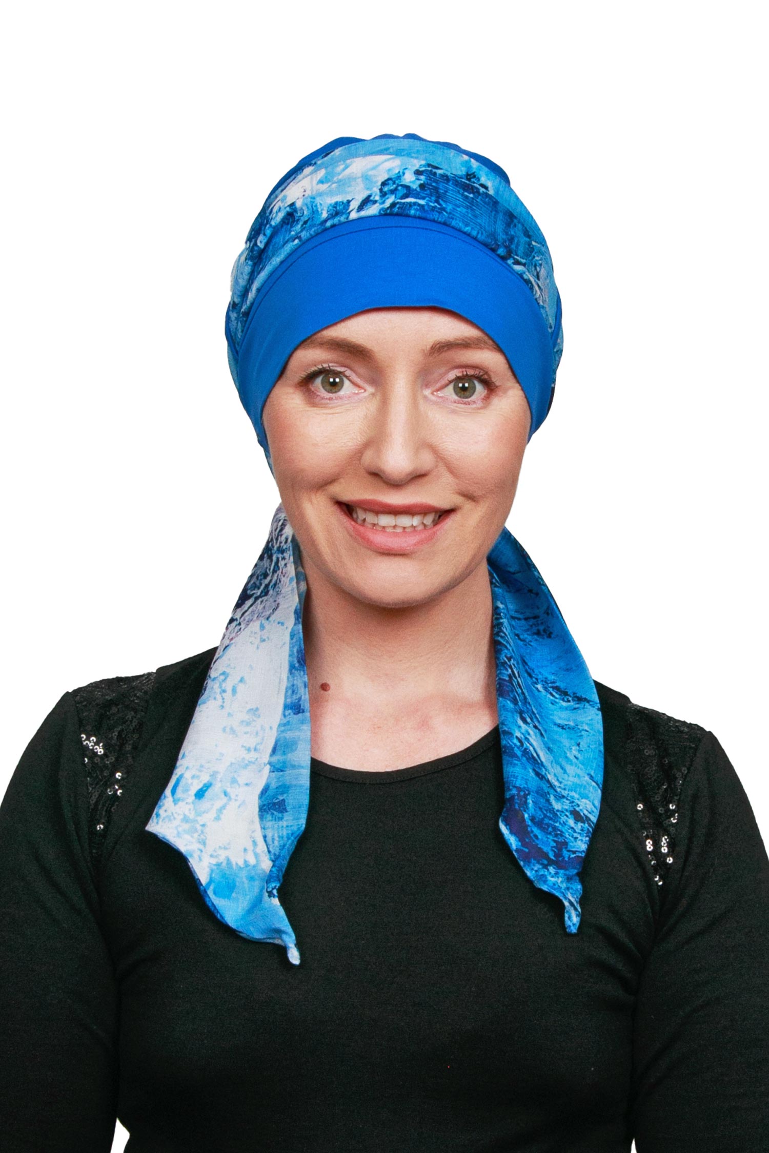Women Wearing a Cancer Scarf Cap with a blue scarf as a headwrap