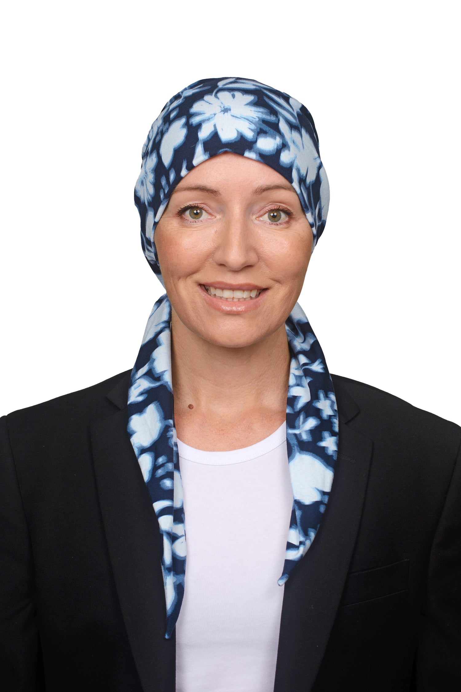 Women wearing a headwrap for cancer in ink and blue as a head covering