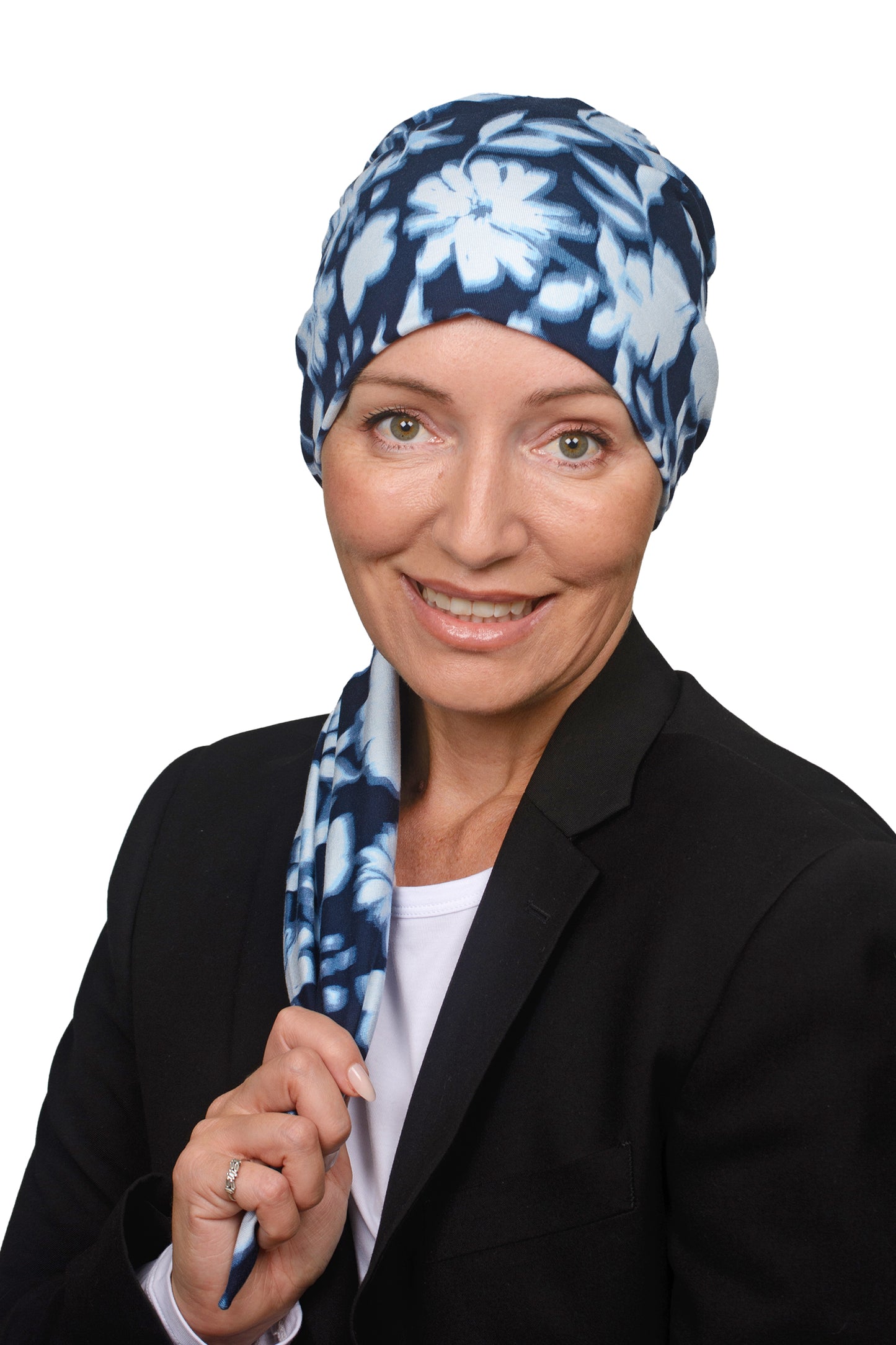 Women wearing a headwrap for cancer in ink and blue as a head covering