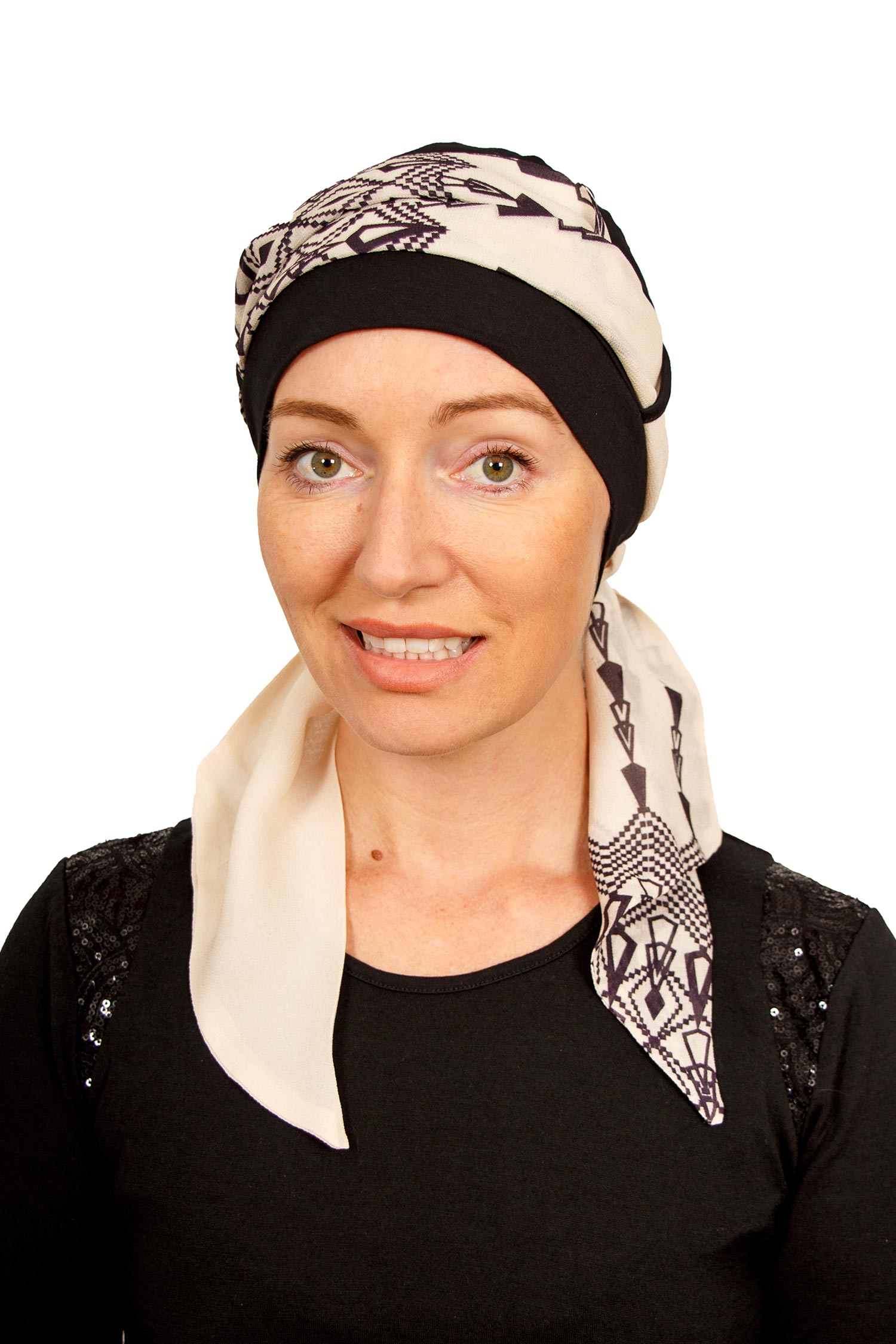 Women Wearing a cancer cap with a scarf attached as a head covering in black in NZ