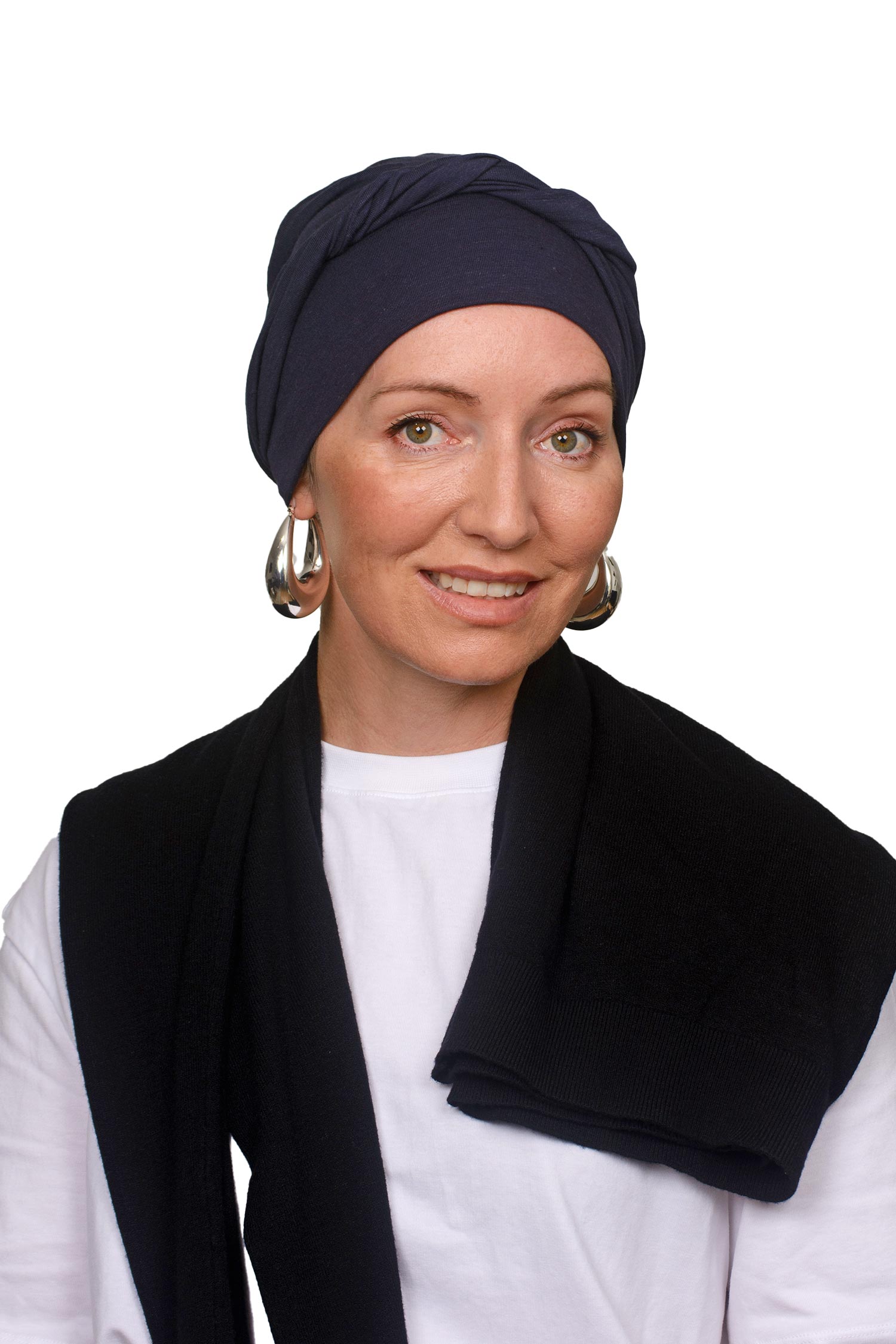 Women wearing an ink cotton cancer hat as a headscarf and head covering