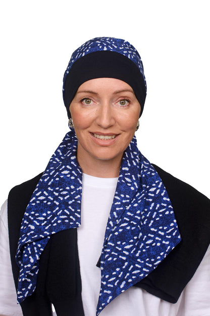Women wearing a headscarf hat in blues and white with an ink band as a headcovering for hair loss