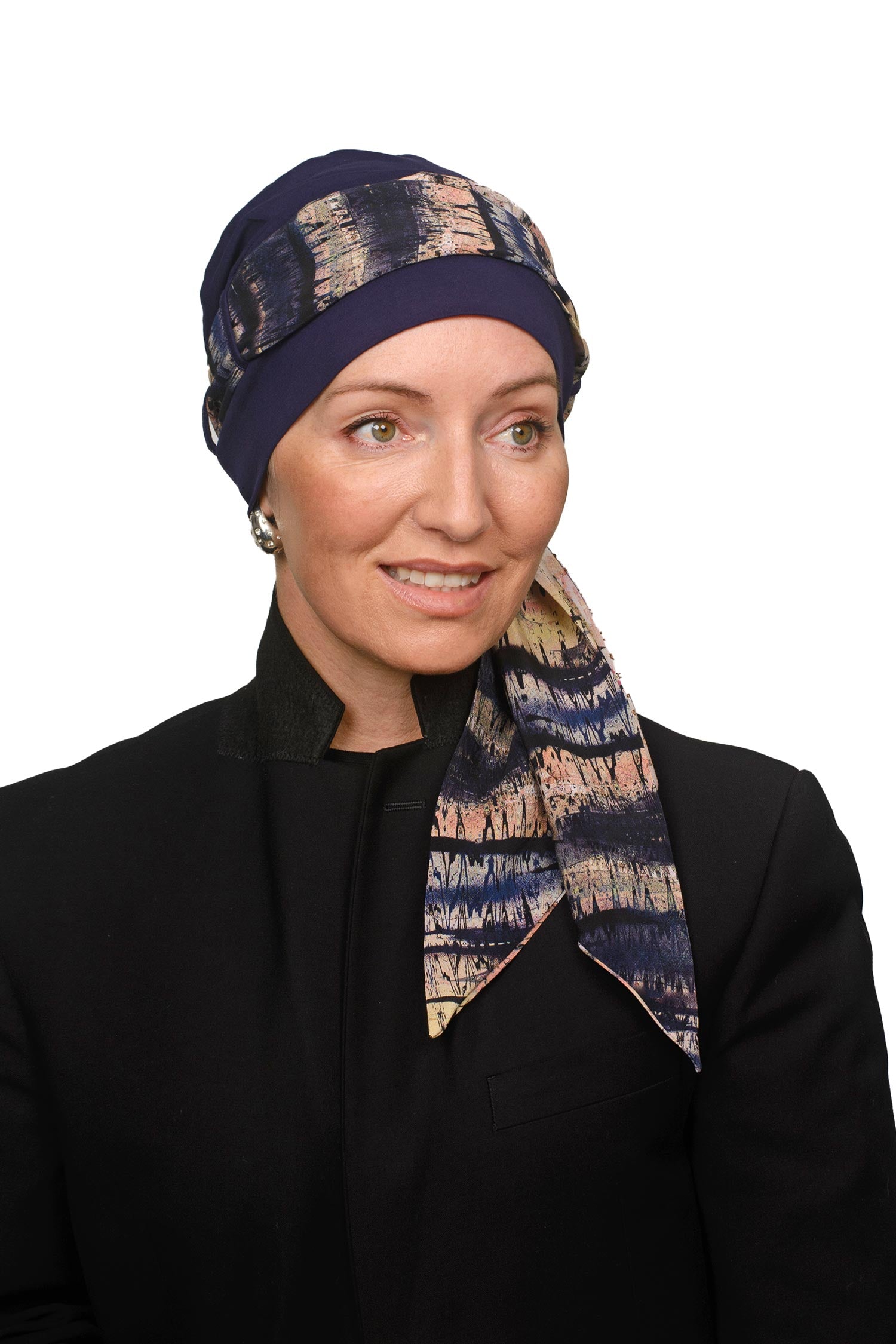 Women wearing a cancer scarf and cap as a headcovering