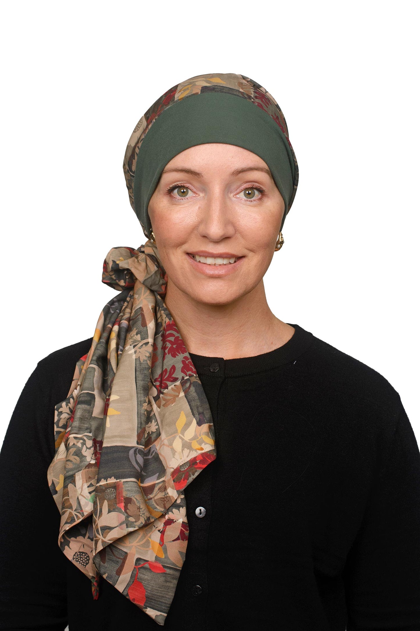 Women wearing a green scarf hat with scrunchie for cancer as a headcovering