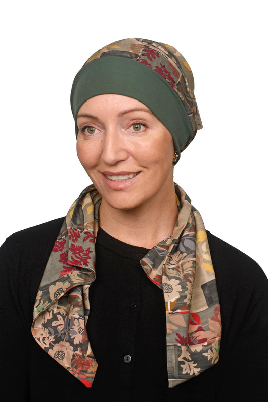 Women wearing a green scarf hat with scrunchie for cancer as a headcovering