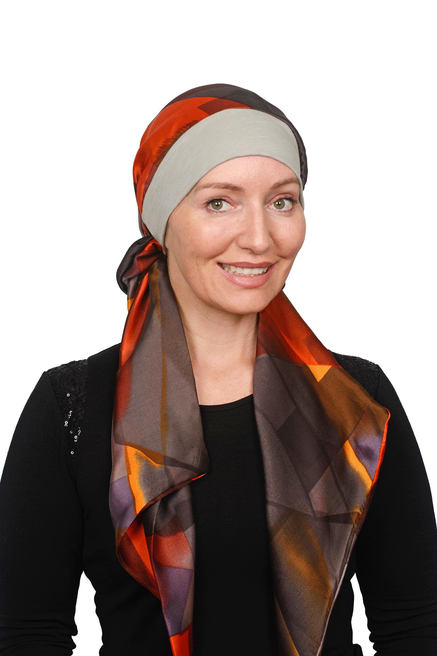 Women Wearing a Sand coloured band cancer scarf hat with a silky brown coloured scarf headcovering