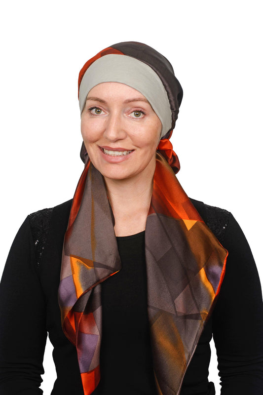 Women Wearing a Sand coloured band cancer scarf hat with a silky brown coloured scarf headcovering