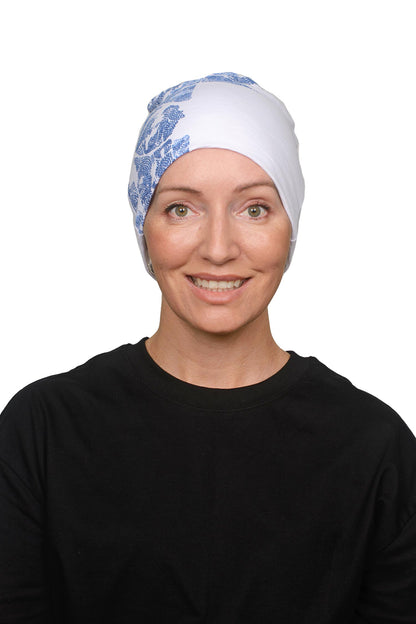 Women wearing a cancer nightcap in white and blue as a headcovering