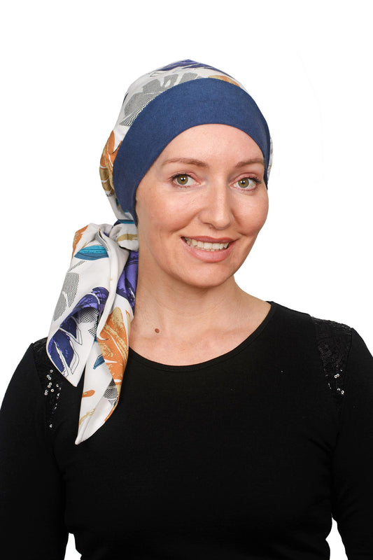 Women Wearing a cancer scarf hat with a scrunchie