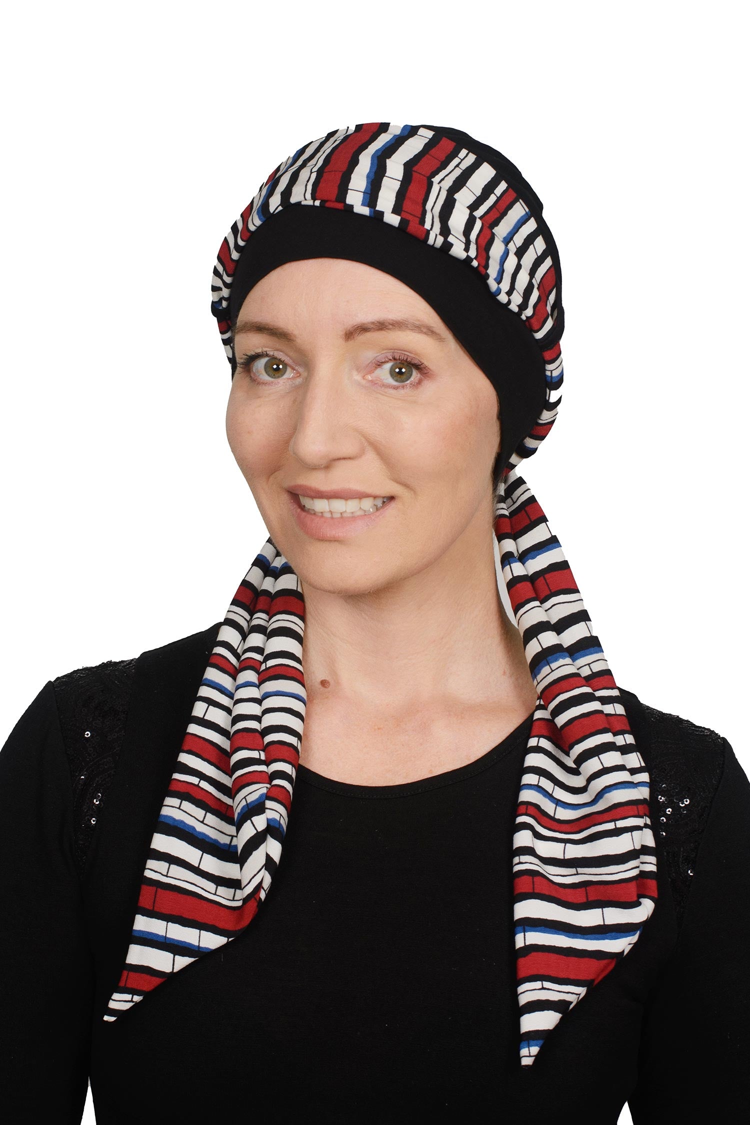 Women Wearing a cancer cap with a stripe scarf attached as a head covering in colours in NZ