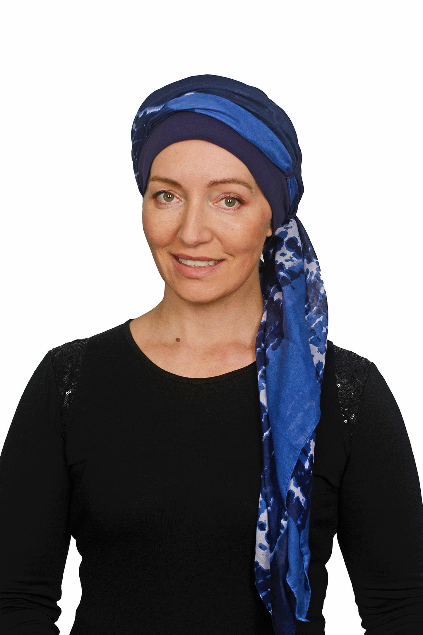 Women wearing a cancer hat with cap and seperate scarf in blue