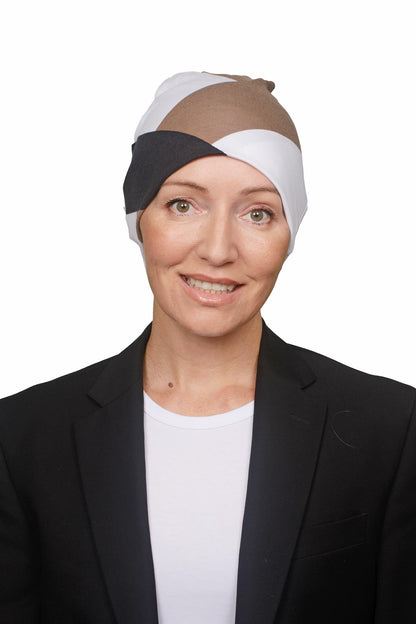 women wearing a cancer nightcap in black white and mocha as a head covering