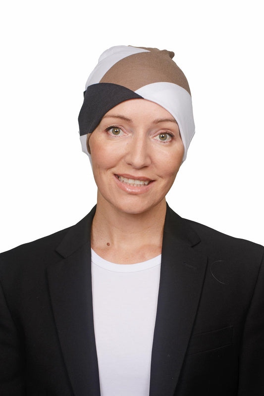 women wearing a cancer nightcap in black white and mocha as a head covering