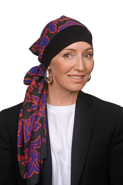 Women wearing a cancer headscarf in black and floral as a headcovering