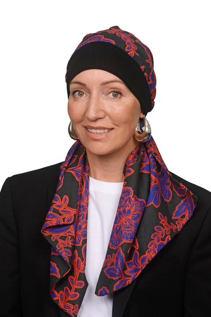 Women wearing a cancer headscarf in black and floral as a headcovering